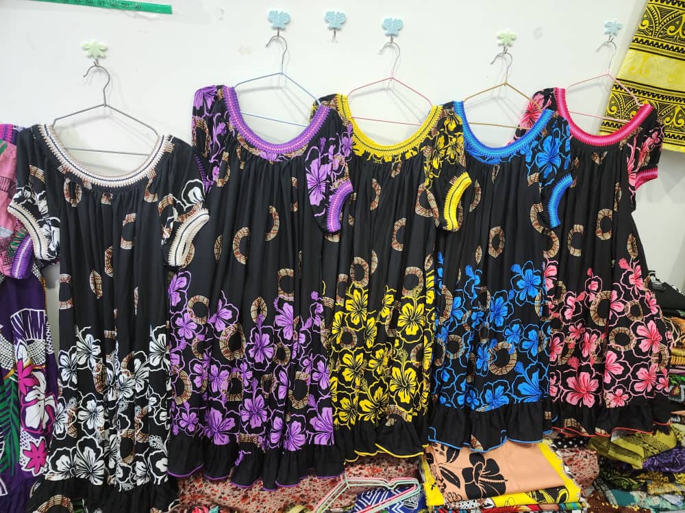 Black dresses with colourful trims