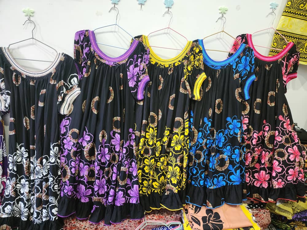 Black dresses with bright trims