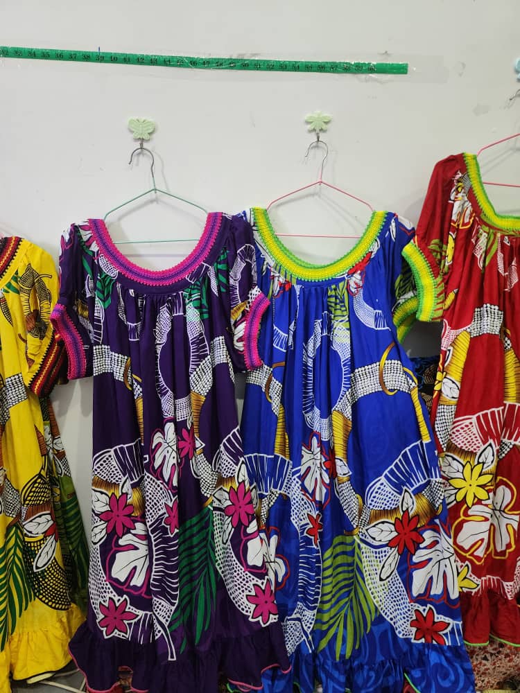 Purple blue red and yellow dresses
