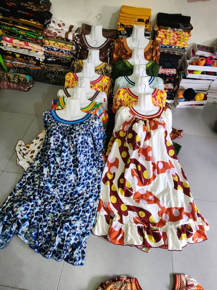 Blue and red dresses on mannequins